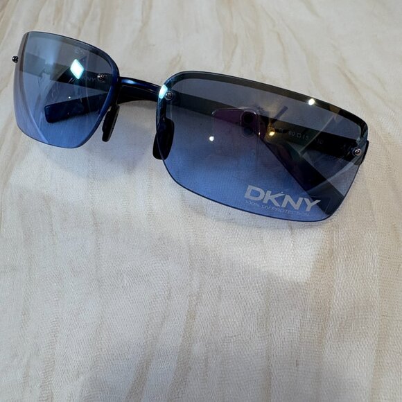 DKNY Frameless Lavender Wrap Tinted Lenses 7220S - Picture 1 of 7